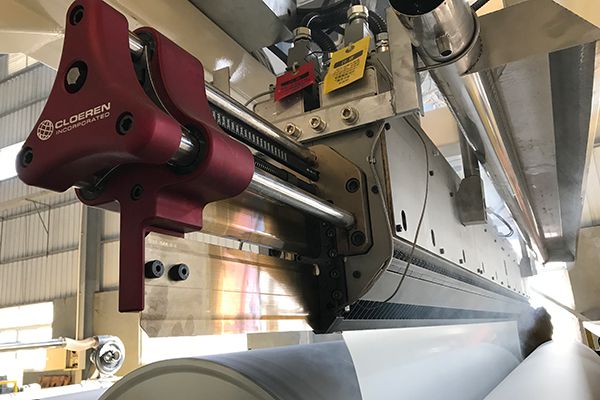 Línea de extrusión para laminación de papel